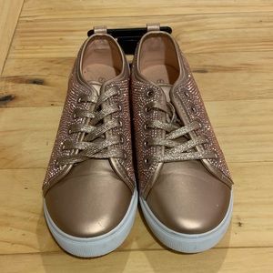 Rose gold tennis shoes